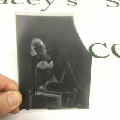 Eight photographic glass plates of a female model, some nude images. Shipping category D. NO RESERVE