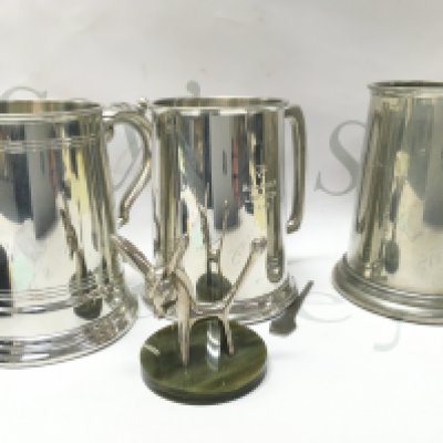 Tankards including a Halstaff pewter example and a Seba silver plated figure. Postage cat B. NO RESERVE