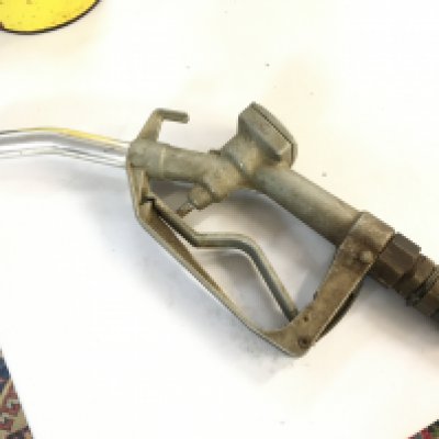 A vintage petrol pump nozzle, no reserve postage category C
