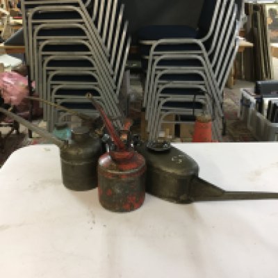 Four vintage Squirty Oil cans, postage category B