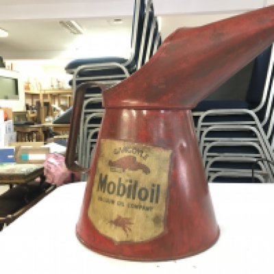 A rare red 1/2 gallon Mobiloil oil jug . Postage category c