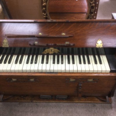 An RF Stevens ship's reed organ. Shipping category D.