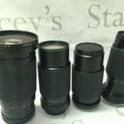 Four vintage cameras lenses- Sigma 210mm, MC Cimko 200mm, Hanimex 200mm, Sirius 200mm