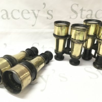 Three pairs of vintage brass binoculars , postage category C