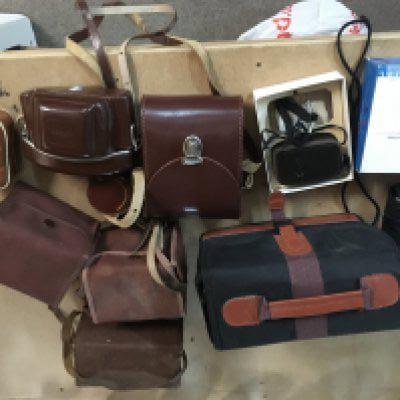 A box containing various cameras and equipment.