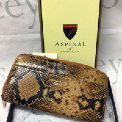 A boxed Aspinal of London leather purse
