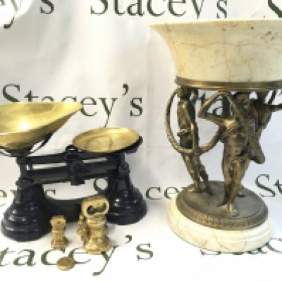 A set of scales and a marble bowl with three simulated bronze figures ornament. This lot cannot be posted