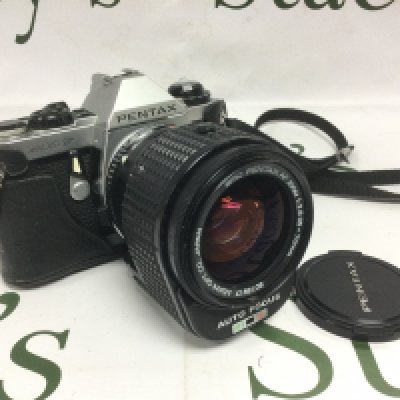 A Pentax camera with AF Zoom lens. Shipping category D.