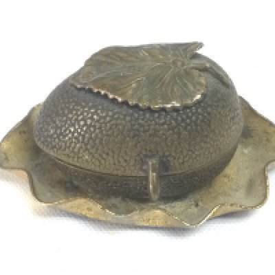 A small brass thimble case in the form of a nut, approx length 4.5cm. Shipping category A.