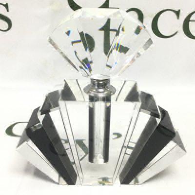 An Art Deco style perfume bottle in clear and black glass, approx height 16.5cm. Shipping category D.