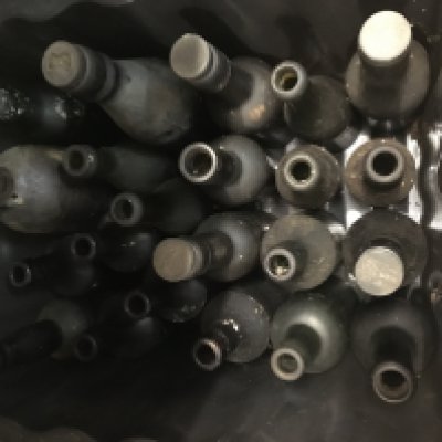 A box containing glass bottles various. NO RESERVE