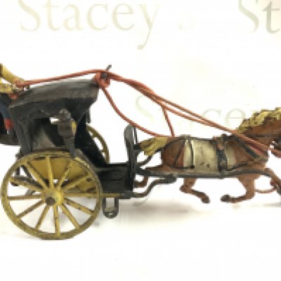 An Early cast iron horse drawn Hanson cab, original paintwork. 29cm. (C)
