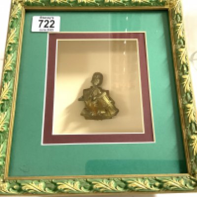 A small bronze West African seated figure of a man mounted within a shadow box display. (A)