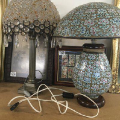 Two side lamps one shade with glass drops .