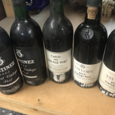 Five bottles of vintage port .