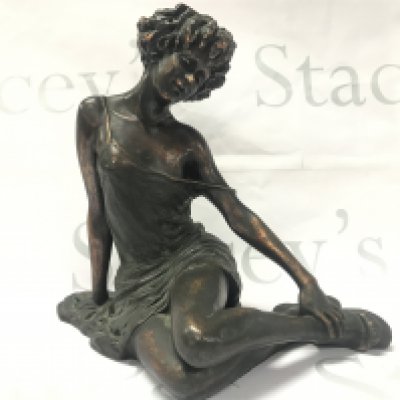 A cold composition bronze classical figure of a seated woman , signed .24cm tall. Postage category B