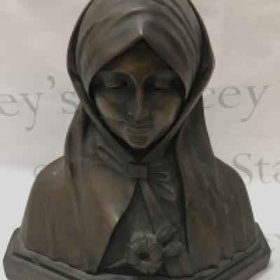 A cold composition bust of Virgin Mary. 36cm tall. Postage category C