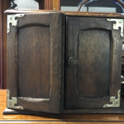 An oak smokers cabinet , dimensions 20x32x28cm