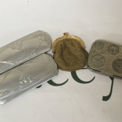 A coin case with sprung cavities a small purse and vintage glasses cases.
