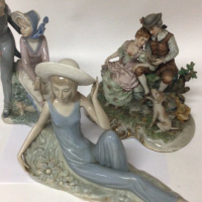 Two Neo porcelain figures a reclining lady in summer dress and a courting couple and a Capodimonte figure (3) NO RESERVE