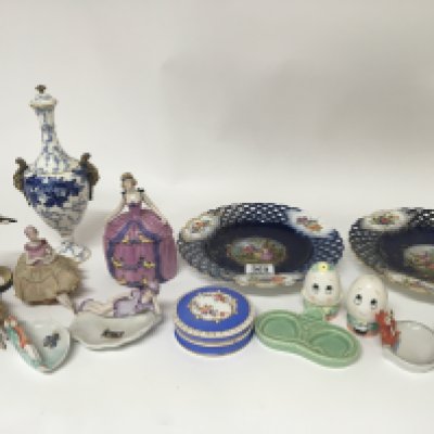 An Early 20th century Coalport blue and white vase a pair of decorative porcelain ribbon plates pin dolls and other ceramics. NO RESERVE
