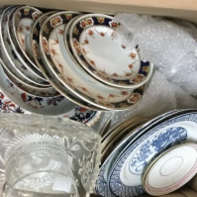A box containing a collection of decorative ceramics and glass. NO RESERVE