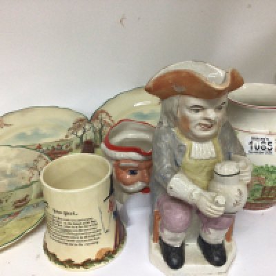 A 19th century ceramic Toby jug a Crown Devon musical jug and six Royal Doulton plates depicting hunting scenes and other ceramics. NO RESERVE