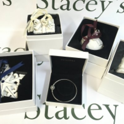 Boxed Pandora porcelain Christmas decorations and a Pandora silver snowflake charm bracelet. This lot cannot be posted