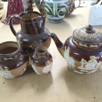 Doulton stoneware with silver rims. Postage D