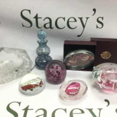 A small collection of glass items comprising mainly paperweights including Goebel and Mdina examples. Shipping category D.