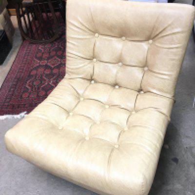 A button backed 1960/70s leatherette chair, Swedfurn signed. Dimensions approximately 74x64x74cm