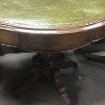 A Victorian walnut occasion table the shaped top above a single drawer on a turned column and shaped legs. 98 cm x 76/cm
