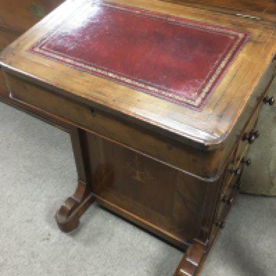 A Victorian walnut Davenport with sloping front fitted with five drawers. NO RESERVE
