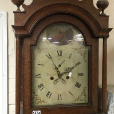 An Early Victorian long case clock eight day going with a painted dial the top arch with Britannia dial with painted inscription Watton. NO RESERVE