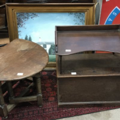 An oak drop leaf table with a twin flap top an oak storage box and a bedside tray. (3)