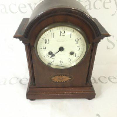 An Edwardian mantel clock.