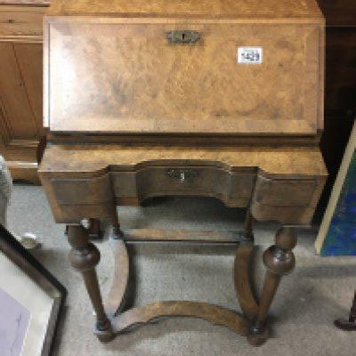 A small walnut bureau.