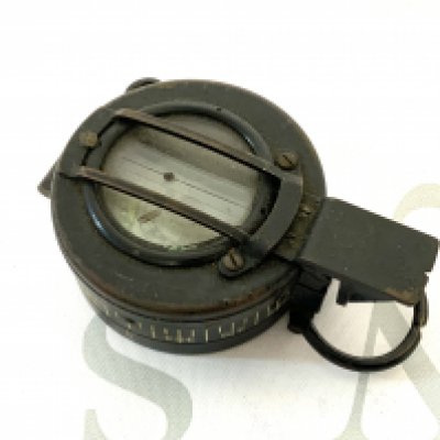 A military issue compass with marks for T.G Co Ltd , No.B 283212, 1944 MKIII