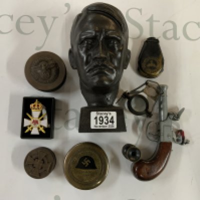 A small collection of German replica militaria including a small bust of Adolf Hitler. NO RESERVE