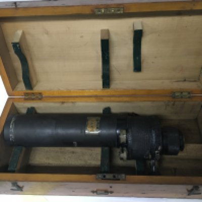 A British Military Prismatic Monocular gunsight in a fitted box.