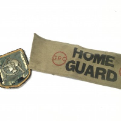 WW2 British GPO home guard arm badge and a badge . Postage cat A