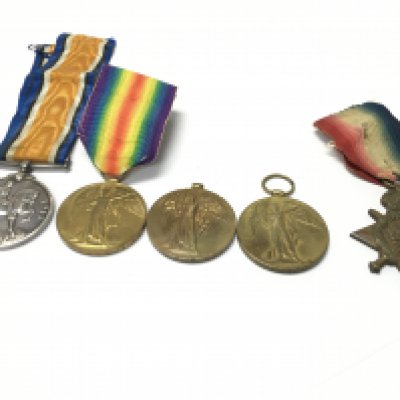 A collection of assorted war medals including an 1914-15 star awarded to Pte A.Bairstow W York.R Victory medals Pte W.J.Smith R.Fus and WKR L M Wilson O.M.A.A.C and two medals awarded to DVR W.J.Edwards R.A