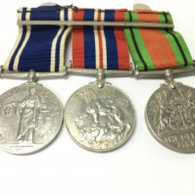 Three medals including an exemplary police service medal awarded to Stn . Sergt Alfred E Stevenson Postage B