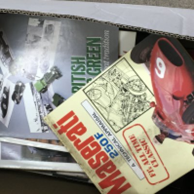 A large collection of books on automobiles engines and other associated books including racing cars and including Vintage books in five boxes.
