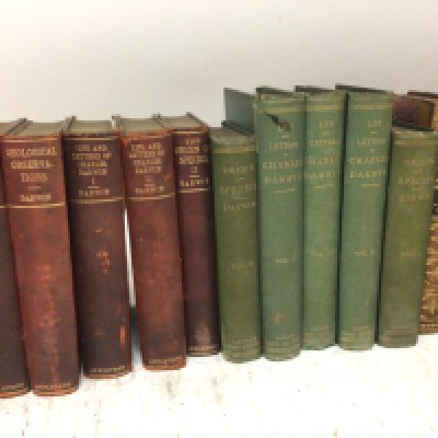 A collection of interesting books including early edition Charles Darwin including Coral Reefs and Geological Observations third edition 1896 Origin of Species 1897.Also two vol leather bound The Every Day Book The Year book 1832 Dickens works in two volumes 1874 and other books