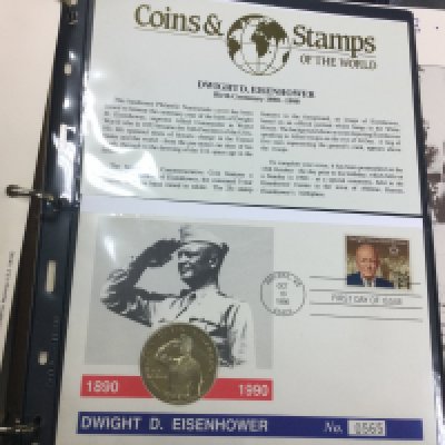 A collection of 12 albums of stamps including the history of world War11 in postage (6 ) Coin covers first day covers and world stamps various.