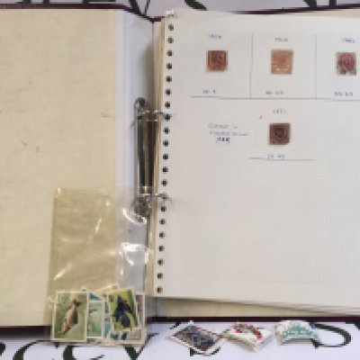 Danish stamp album containing used pre 20th century and early- later 20th century stamps.