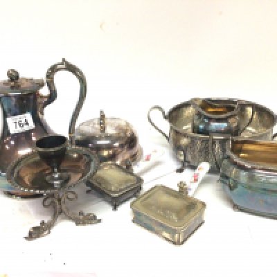 A collection of silver plate a muffin dish tea pot sugar bowl and cream jug and other oddments. NO RESERVE