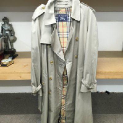 A Burberry long coat. Postage category C