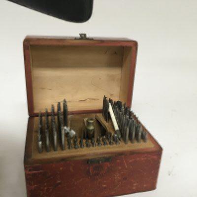A watchmakers Vintage Conecta Standard staking set tool punch in a fitted case.